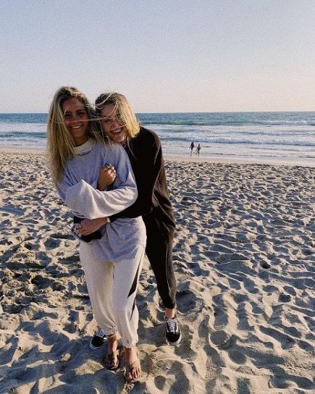 Chelsea Cutler and Tilly Burzynski posing a picture at the beach.